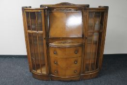 A 1930's side by side bureau display cabinet