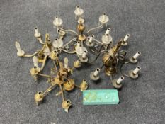 Three early 20th century brass chandeliers with brass drops and a further eight branch chandelier
