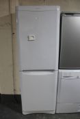 An Indesit frost free upright fridge freezer