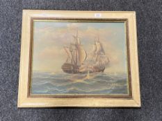 A painted framed oil on board - galleon in battle, by S.