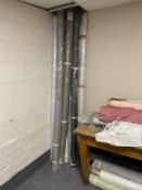 Ten assorted rolls of fabric