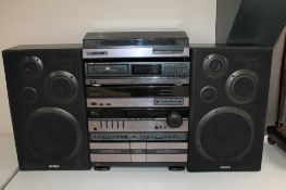 A five piece Aiwa stack system and a pair of speakers