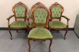 A set of four Italian style dining chairs