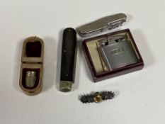 A Mauchline ware thimble case containing a Charles Horner silver thimble,