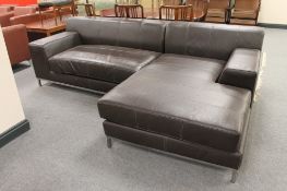 A brown leather corner settee