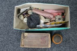 A box of sewing accessories, thread etc,