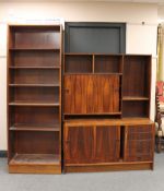 A mid 20th century Danish rosewood effect bookshelf and matching shelving unit