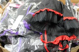 A box of Phaze pinafore dresses