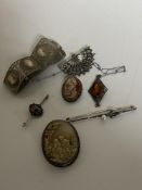 A collection of silver jewellery, panel bracelet,