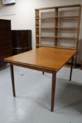 A mid 20th century Danish teak extending dining table