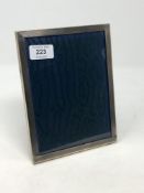 A silver easel photo frame, 15.5cm by 20.