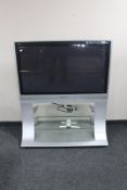 A Panasonic Viera 42 inch plasma TV on stand with lead and remote