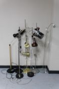 Seven assorted metal floor and spot lamps