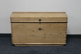 An antique pine trunk CONDITION REPORT: Height 59cm width 97cm depth 53cm