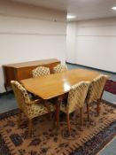 A mid 20th century walnut seven piece dining room suite : dining table 182 cm extended,