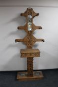 A late Victorian carved oak mirrored hall stand