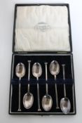 A set of six silver tea spoons in case,