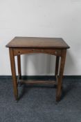 An oak Arts and Crafts occasional table