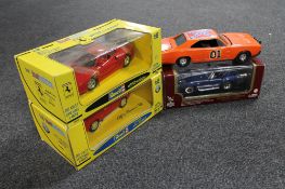 Two boxed Rebel 1:18 die cast vehicles - Ferrari and Alpha Romeo together with a boxed collection