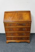 An inlaid mahogany Georgian style bureau