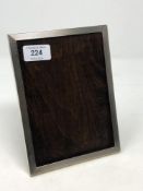 A silver easel photograph frame, 14.5cm by 19.