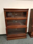 A three tier Globe-Wernicke stacking bookcase,
