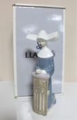 A Lladro figure - Meditation (blue), in original box.