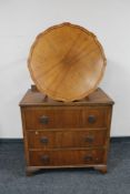 A 1930's walnut three drawer chest together with a walnut pie crust coffee table