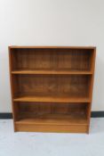 A set of mid 20th century teak open shelves