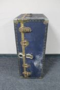 An early 20th century metal bound travelling trunk