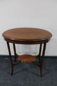 A Victorian inlaid mahogany occasional table