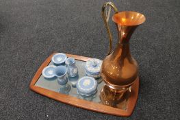 A mid 20th century teak framed bevelled mirror,