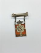 An unusual Georg Jensen silver and enamel pendant, Christian X of Denmark,