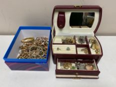 A leather jewellery box together with a further box containing costume jewellery, necklaces,