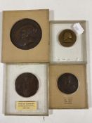 Four copper medallions in display boxes to include William Sandcroft 1678-1691,