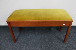 An Evestaff storage duet piano stool