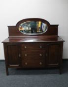 An Edwardian mahogany mirror backed sideboard