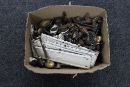 A box of Victorian door handles, finger plates,