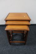 A nest of three teak G-plan tables