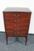 An Edwardian five drawer music cabinet
