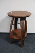 An American barrel topped two tier bar table