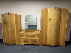 A three piece 1930's walnut bedroom suite