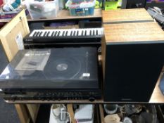 A National Panasonic SG-1090 L compact stereo system with teak cased speakers