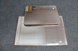 A gilt framed bevelled mirror together with a frameless early 20th century mirror