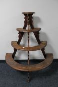 A set of demi-lune mahogany plant stand steps