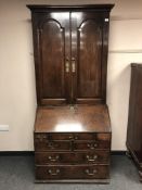 A Georgian oak bureau bookcase
