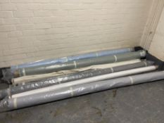 Ten assorted rolls of fabric