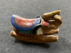 A hardwood rocking elephant