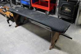 An antique pine kitchen bench