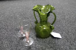 Two 18th century glasses with coloured and cotton air twist stems together with a further antique